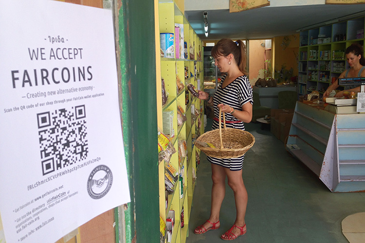 Shopping with Fair Coins, a solidarity-based cryptocurrency