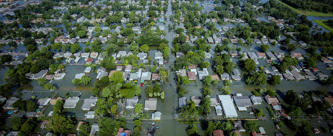 Aerial photo of many flooded houses in Houston after Hurricane Harvey.