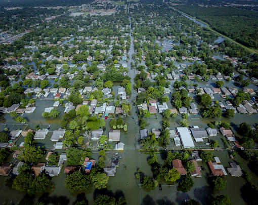 Aerial photo of many flooded houses in Houston after Hurricane Harvey.