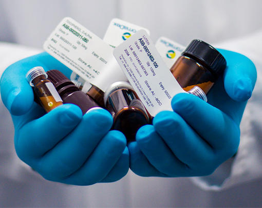 Pharmacist holding medicines