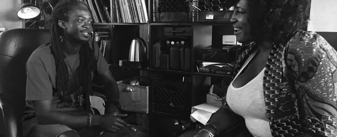 Two people discussing music and art